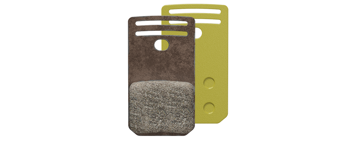 Two MAGURA disc brake pads in gold/yellow, front and rear visible.