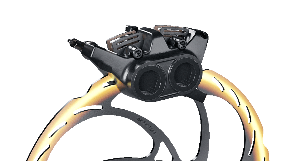 Close-up of a MAGURA caliper mounted onto a brake disc.